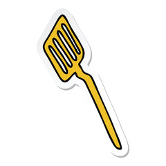 sticker of a quirky hand drawn cartoon spatula