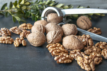 Walnuts on a black background, walnut kernels. Healthy food from walnut.