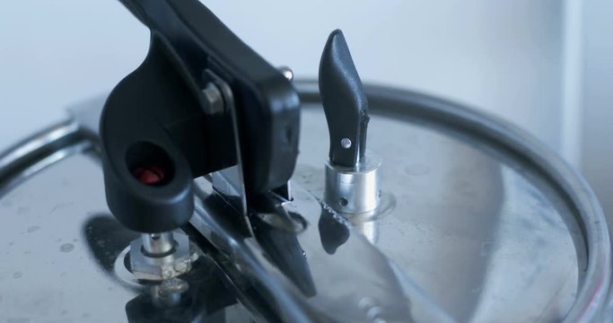 Pressure cooker, safety valve released, decompression