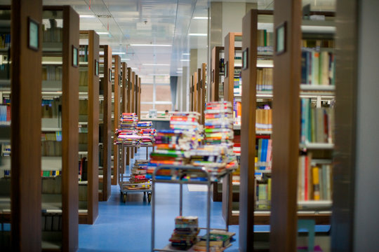 Books to be stacked in a library.