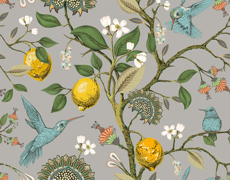 Floral vector seamless pattern. Botanical wallpaper. Plants, birds flowers backdrop. Drawn nature vintage wallpaper. Lemons, flowers, hummingbirds, blooming garden. Design for fabric, textile, paper