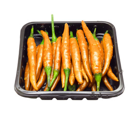 Gold chilli peppers, hot pepper in Packing on isolated white background