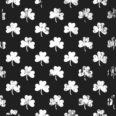 Grunge pattern with shamrock.  Square black and white backdrop.