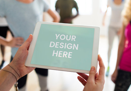 User Holding Tablet Mockup