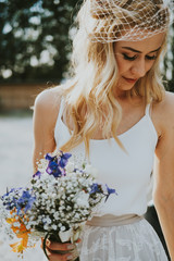 Young bride with bouquet