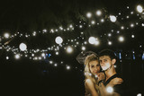 Young couple under lights