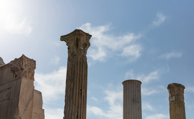 Athens Greece. Hadrians library columns, blue sky background, sunny day, Monastiraki area.