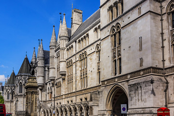 Architectural fragments of Royal Courts of Justice Complex. Royal Courts of Justice in the Victorian Gothic style (or Law Courts, was opened in December 1882) in London, UK.