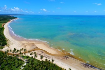 Aerial view of Cumuruxatiba Beach, Prado, Bahia, Brazil. Great landscape. Beautiful beach and river...