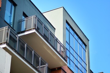 Fototapeta premium Modern condo building with huge windows