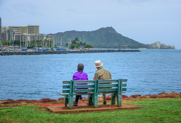 Couple enjoying the Honolulu's harbor in Oahu, Hawaii