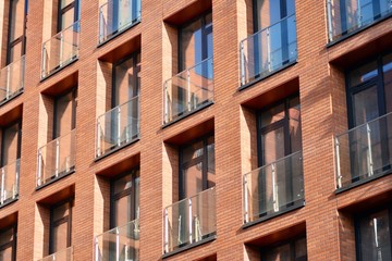 Modern condo building with huge windows