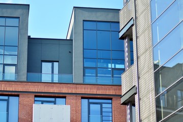 Modern condo building with huge windows