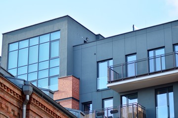 Modern condo building with huge windows