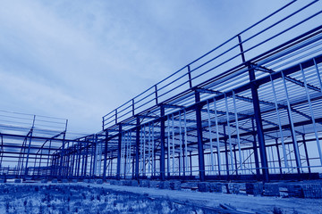 Fototapeta premium The steel frame structure is under construction