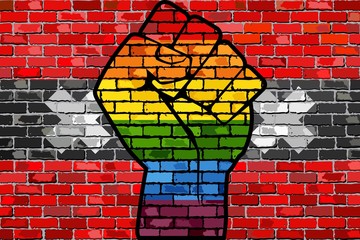 LGBT Protest Fist on a Amsterdam Brick Wall Flag - Illustration,  Brick Wall Amsterdam and Gay flags