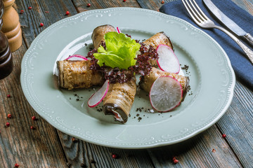 Eggplant rolls stuffed with nuts