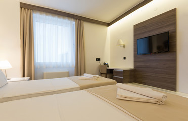 Fototapeta premium Interior of a modern new hotel bedroom