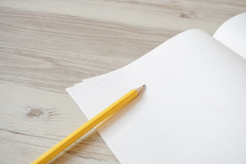Note and pencil on the desk.  デスクの上のノートと鉛筆