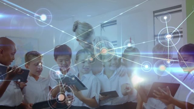 School children with their teacher showing digital connections 