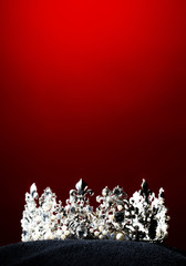 Silver Diamond Crown of Miss Pageant Beauty Universe World Contest sparkle light on black pillow, ready for wear Most beautiful Winner, studio lighting super red gradient background dramatic © Jade