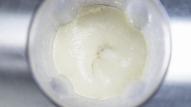 High angle close up, blending vanilla milkshake