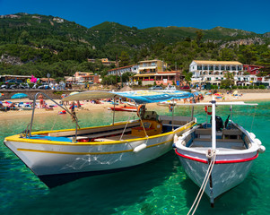 Fototapeta na wymiar Tourists queue for boats in Palaiokastritsa, Corfu