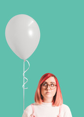 Pink haired girl with a balloon