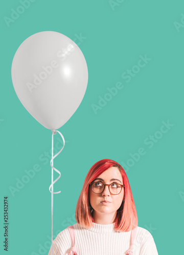 Pink haired girl with a balloon