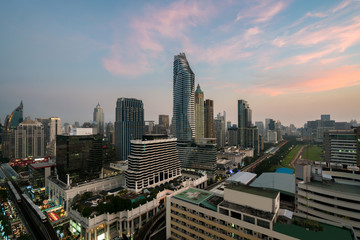 Fototapeta premium Modern building in Bangkok business district at Bangkok city with skyline before sunset, Thailand.