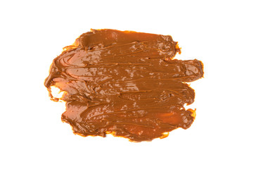 Boiled condensed milk isolated on white background.