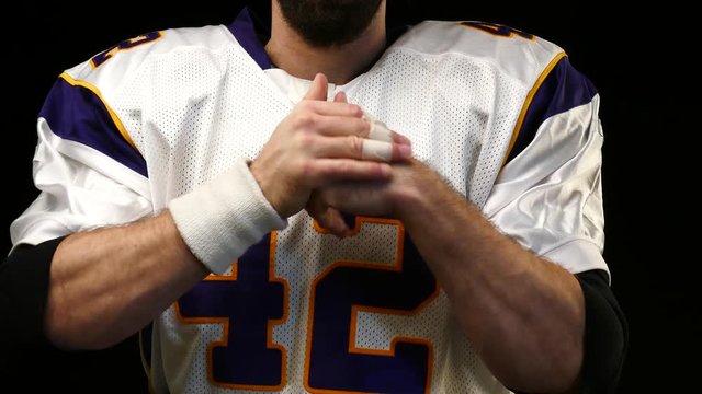 American Football Player's hands