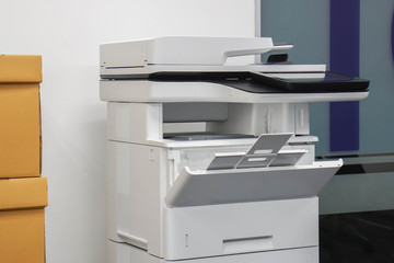 multifunctional office laser printer for use in scanning and printing documents in workplace
