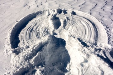 Round Shape Pattern in Virgin White Snow on a cold winter day