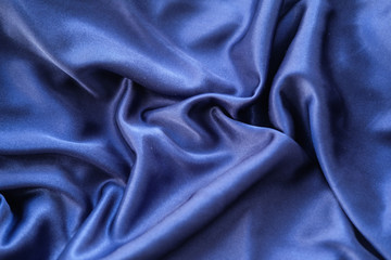 Fabric blue waves - material for background and texture.
