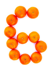 Number solved with tangerines isolated on white background. Mandarine number «6»