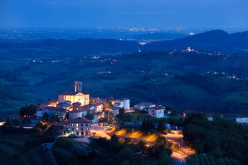 Cultural Heritage Monument medieval hilltop village of Smartno Brda Slovenia at dusk with Saint...