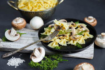 Homemade pasta with mushrooms. Delicious rustic dish, one large portion.