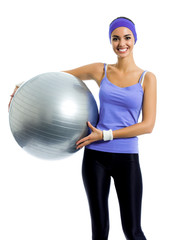 Fototapeta premium smiling woman holding fitness pilates ball