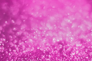 pink shining gold sand made of glitters - bar concept with bokeh texture - fantastic abstract photo background