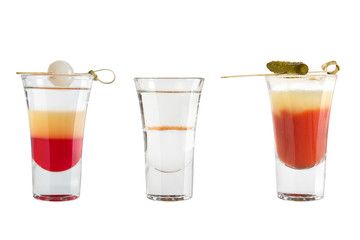 Popular alcohol shots on a white background. Three different shots with decoration.