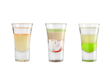 Alcohol shots on a white background. Three popular tequila shots.