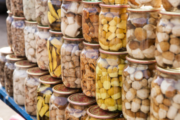 Marinated mushrooms in glass jars