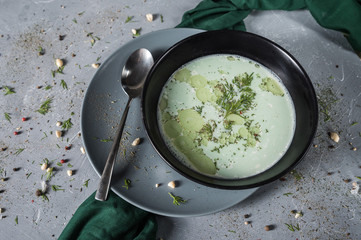 Tasty peas soup on grey background