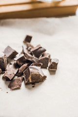 Grated chocolate on the table. Selective focus.