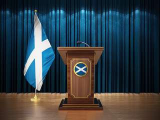 Press conference with flags of Scotland and lectern against the blue curtain. 3D illustration