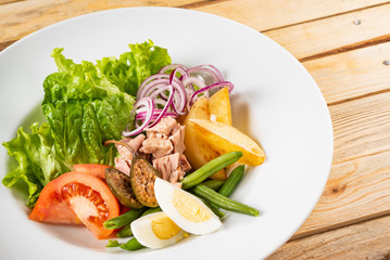 tuna salad on the wooden background