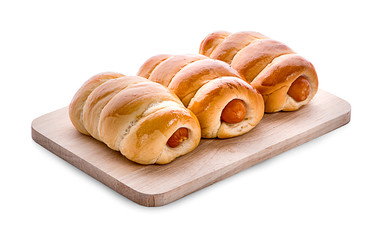 Sausage in dough .Isolated on white background