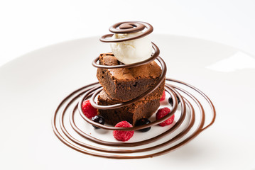 brownie with ice cream and berries