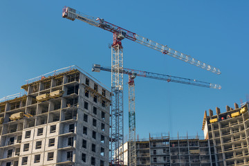 Construction site, high-rise multi-storey buildings under construction
